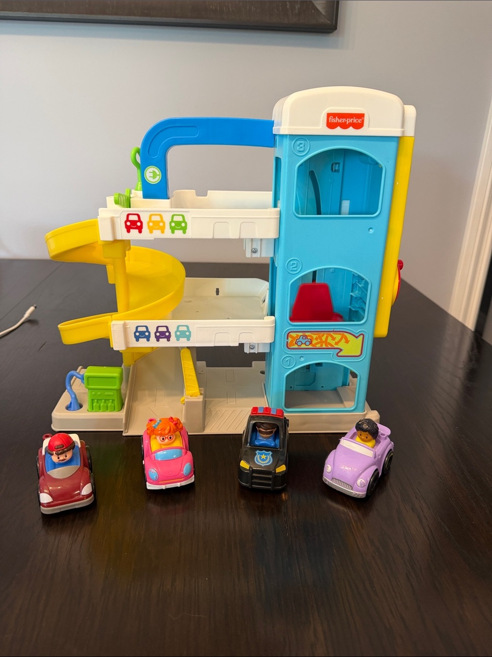 Fisher-Price Blue, Yellow & White Spiral Garage Playset with 4 Small Cars